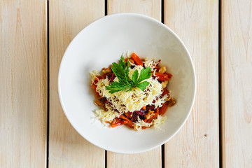 Salad with beetroot, walnut, dried apricot and cheese