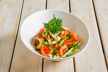Salad with fresh tomato, cucumber and boiled chicken fillet