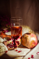Pomegranate and pomegranate juice. Pomegranate still life