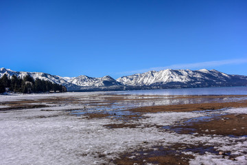 Beach covered by snow along the Lake Tahoe in California