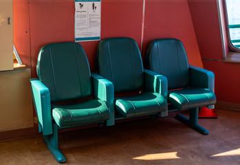 Three folding seats aboard a state ferry