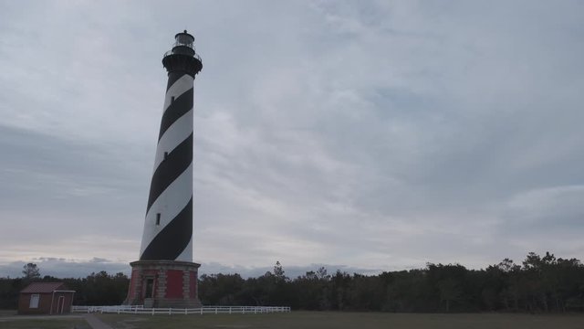 Historic Cape Hatteras Lighthouse in the Cape Hatteras National Seashore just after sunrise, Outer Banks, North Carolina, USA