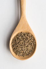 Cumin Seeds on a Wood Spoon