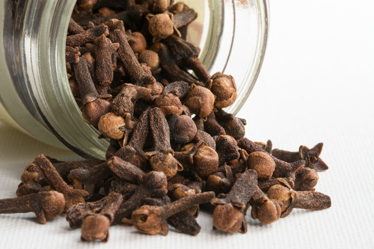 Whole Cloves Spilled from a Spice Jar