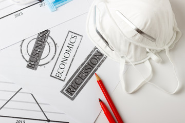 Protective masks and different financial terms, signs and symbols