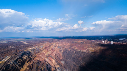 Fototapeta premium Huge iron ore quarry opencast mining of iron ore opencast mining.