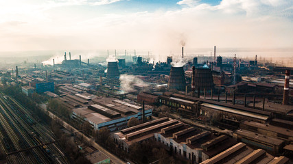 Fototapeta na wymiar metallurgical production plant full cycle smoke from pipes bad ecology aerial photography