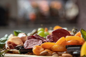 Closeup of Gourmet Charcuterie Board with Copy Space. Macro Selective Focus.