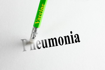 Pencil-eraser with the inscription vaccine trying to remove the word 