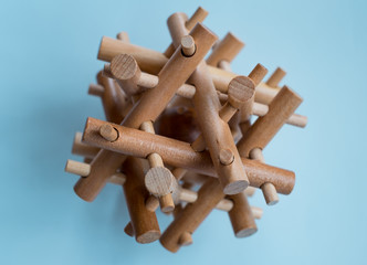 Wooden Brain Bamboo Puzzle on blue background