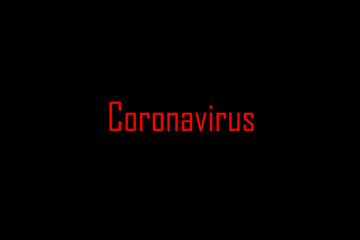 Inscription of Coronavirus (Covid-19) made white on black. The most dangerous virus of the 21st century. Disease and infection. The invincible monster of world scale