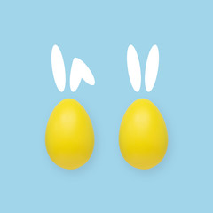 Easter blue and yellow eggs on a colored background with painted rabbit ears.