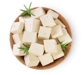 tofu cheese in wooden bowl isolated on white background with clipping path and full depth of field, Top view. Flat lay