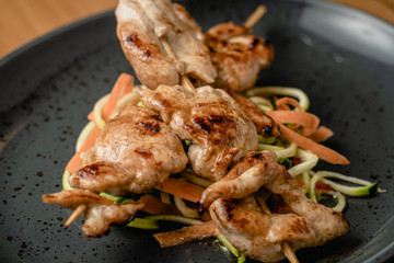 Grilled meat on a plate in a restaurant
