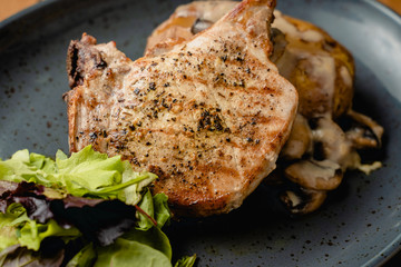 Grilled meat on a plate in a restaurant