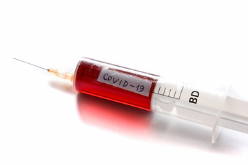 This is a view of syringe with blood for virus COVID-19 testing