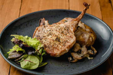 Grilled meat on a plate in a restaurant