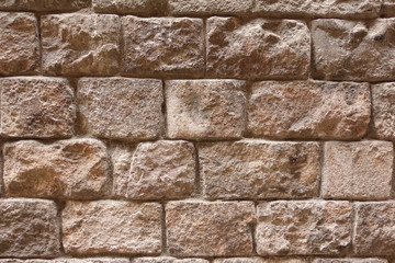 Background of stone wall texture, older brown bricks