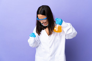 Scientist woman investigating a vaccine to cure coronavirus disease celebrating a victory