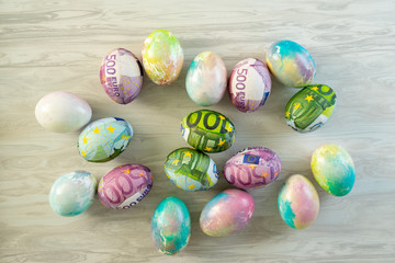 Colorful eggs for Easter decorated with euro .