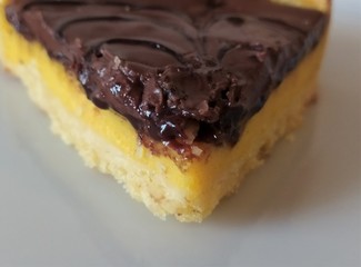 Semolina cake (torta di semolino) with chocolate. Italian cuisine. Slice of chocolate cake, close up.