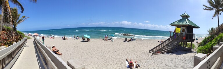 Fototapeta premium beach with chairs and umbrellas