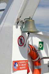 Ship's bell and rescue tyre on a ferry - Schiffsglocke und Rettungsreifen auf einer Fähre
