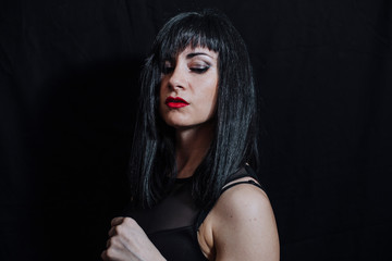 Fototapeta premium woman posing on black background