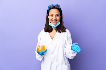 Scientist woman investigating a vaccine to cure coronavirus disease shaking hands for closing a good deal