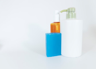 Shampoo bottles close-up. White background. A photo was taken in the studio.