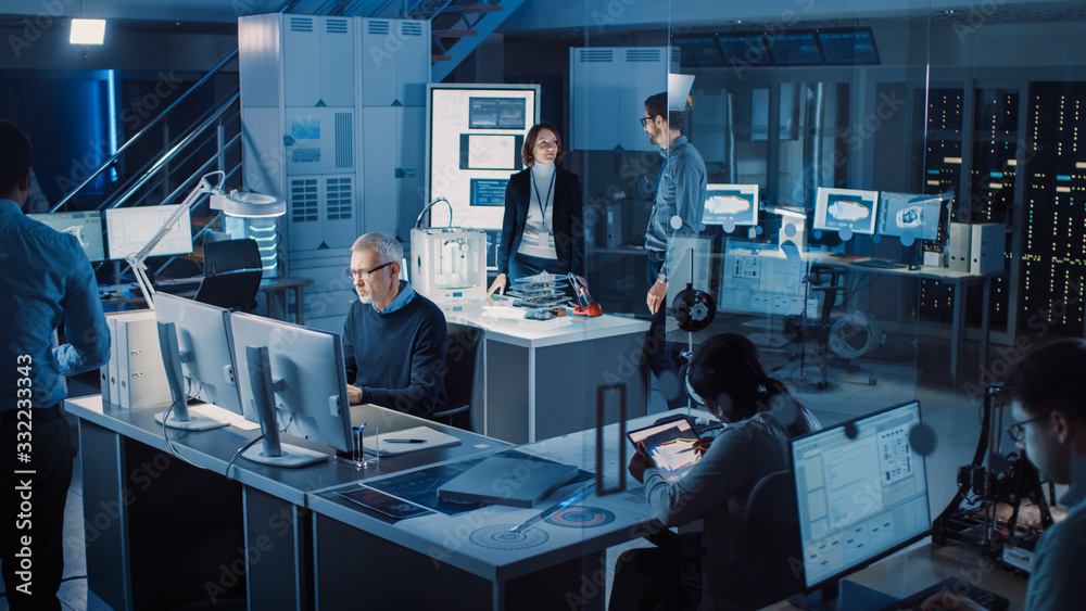Fototapete Diverse International Team of Industrial Engineers and Scientists Working in Research Laboratory / Development Center. People Working on Efficient Engine Design, Using Computers, Advanced Technology