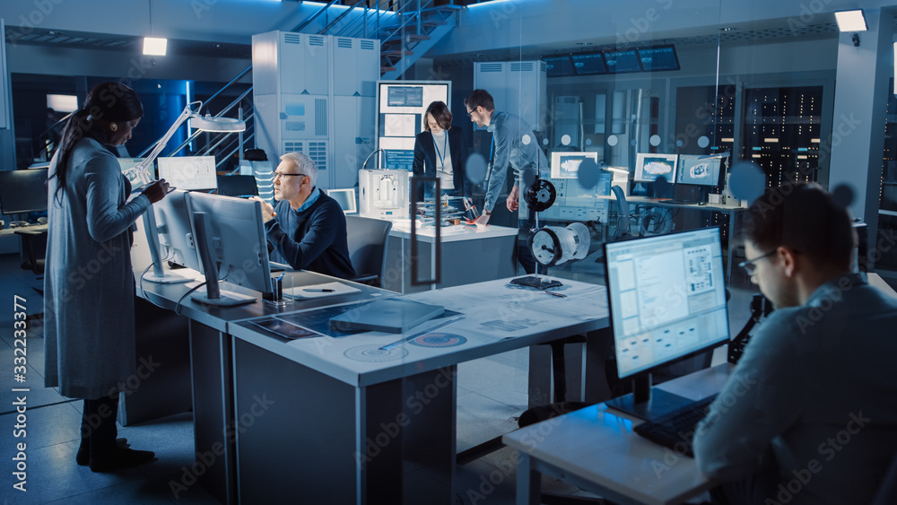 Poster Diverse International Team of Industrial Engineers and Scientists Working in Research Laboratory / Development Center. People Working on New Efficient Engine Concept Design. Professionals Teamwork