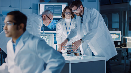 Shot in Industrial Design Laboratory, Specialist Uses Microscope, Designer Works on Personal...