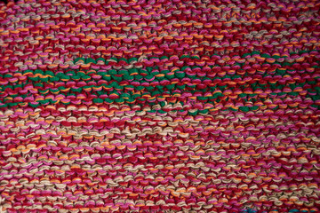Knitted texture in pink shades by macro technique shawl knitting