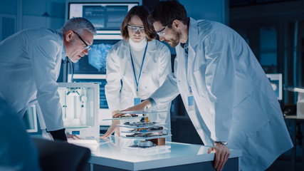 Shot in Industrial Design Laboratory, Specialist Uses Microscope, Designer Works on Personal...
