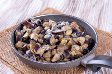 Frozen eggplant in a pan