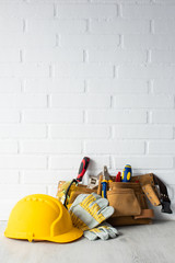 construction worker helmet with tools