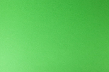 green paper background, copy space, horizontal.