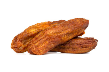 Sun-dried bananas on a white background. Dried bananas close-up.