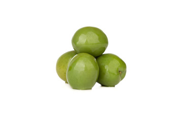 Pickled olives on a white background. Several pickled green olives isolated on a white background.