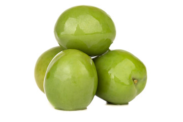 Pickled olives on a white background. Several pickled green olives isolated on a white background.