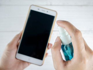 Use alcohol to clean the phone for protection against the corona virus.
