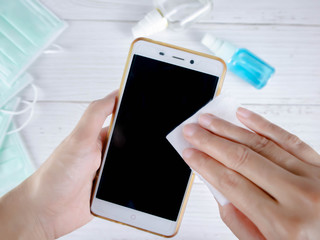 Use alcohol to clean the phone for protection against the corona virus.