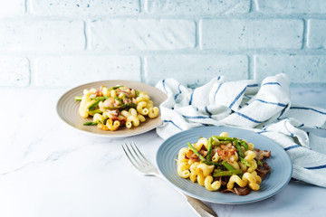 Fried Bacon roasted asparagus pasta in a plate