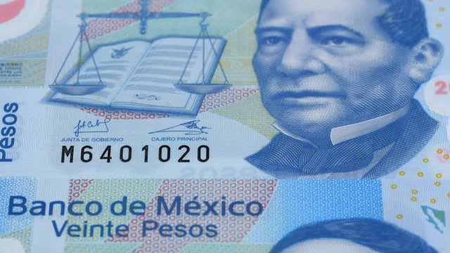 Mexico peso notes fast tracking. Mexican money. Slider shot. Low angle, 4K