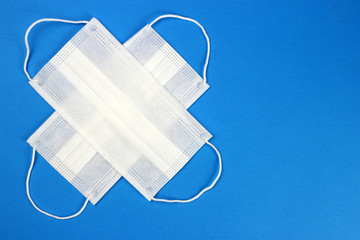 Cross from Medical protective shielding bands on a blue background