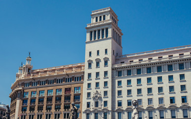 Buildings of Public Library of Barcelona and Banco Espanol de Credito at Catalonia Square, Spain