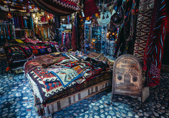 Textiles shop in Morica Han building at old bazaar and the historical and cultural center of the Sarajevo called Bascarsija, Bosnia and Herzegovina - obrazy, fototapety, plakaty