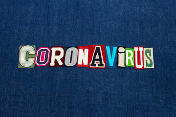 CORONAVIRUS text word collage, worldwide pandemic flu virus, colorful letters on blue denim, horizontal aspect