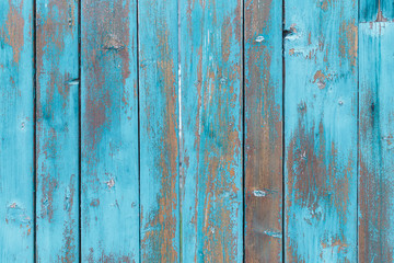 Fototapeta na wymiar Blue wooden boards or fence texture background or backdrop with old paint
